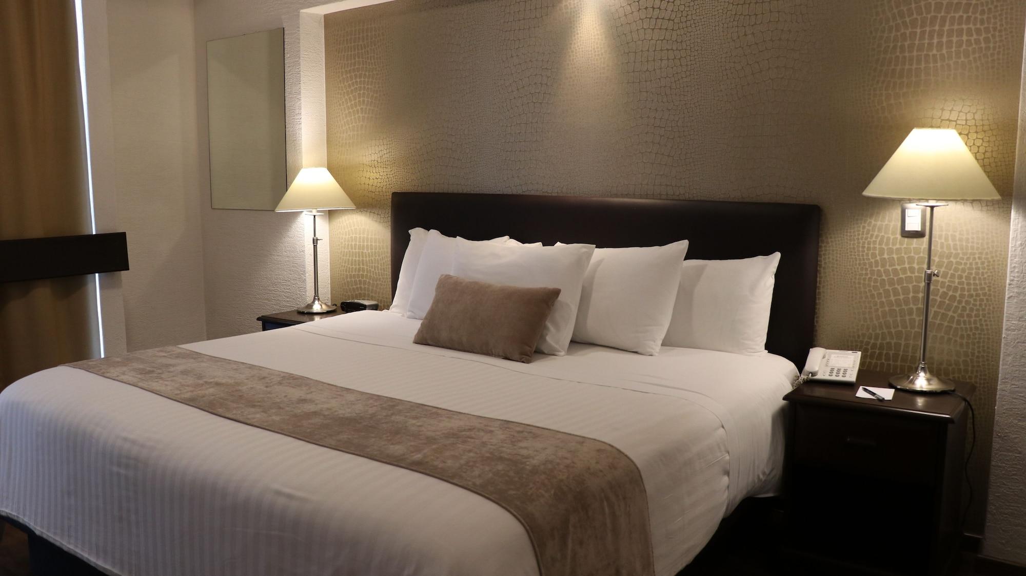 Meson Ejecutivo Guadalajara Minerva - Av Mexico Hotel Bagian luar foto