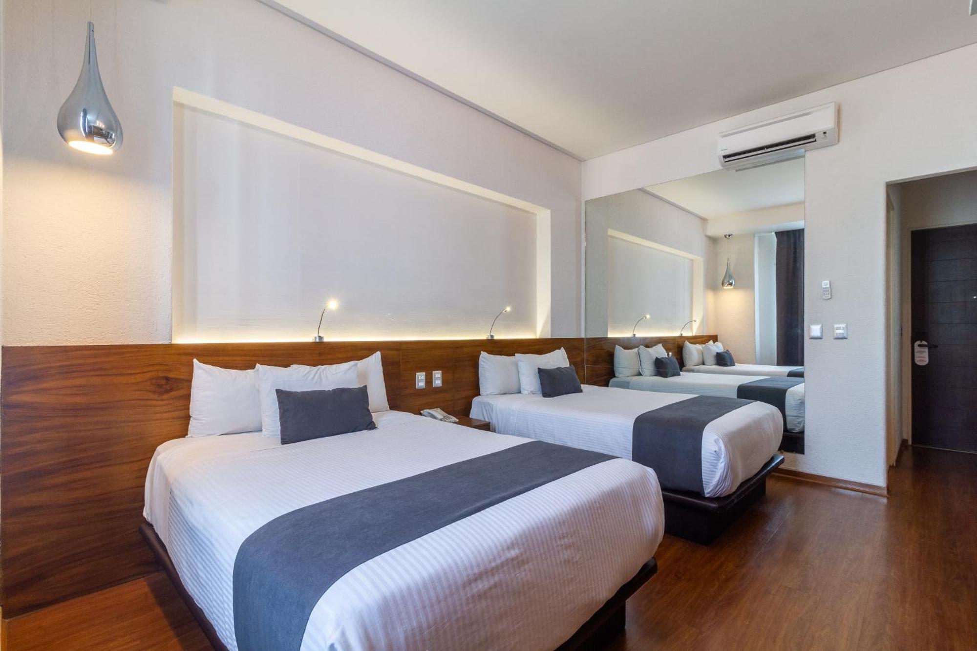 Meson Ejecutivo Guadalajara Minerva - Av Mexico Hotel Bagian luar foto