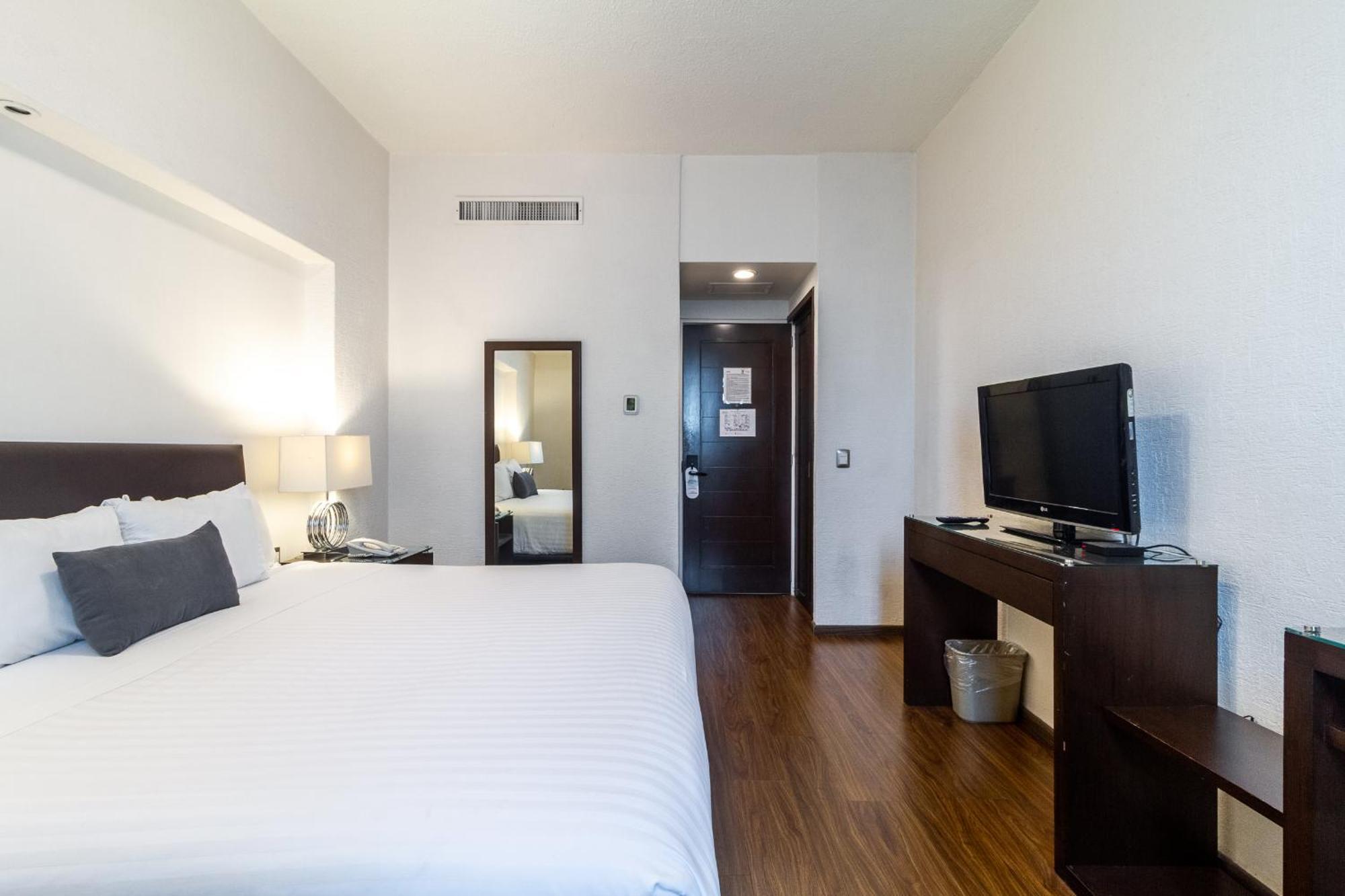 Meson Ejecutivo Guadalajara Minerva - Av Mexico Hotel Bagian luar foto